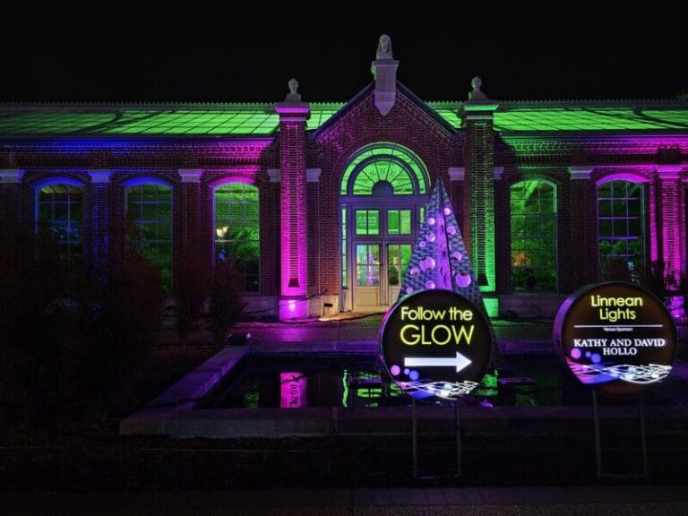 Brick Building, Pond and Sign with Christmas Lights at Missouri Botanical Garden Glow